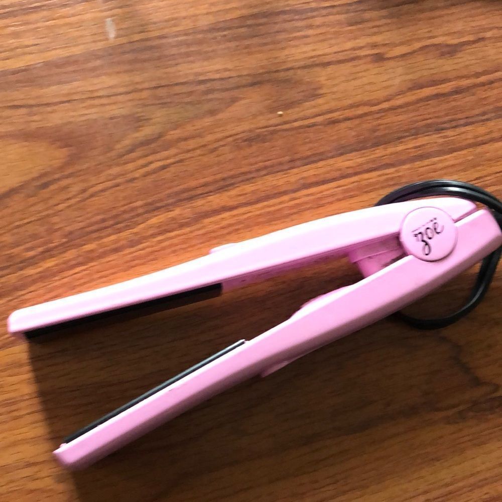 ZOE mini pink flat iron travel iron.